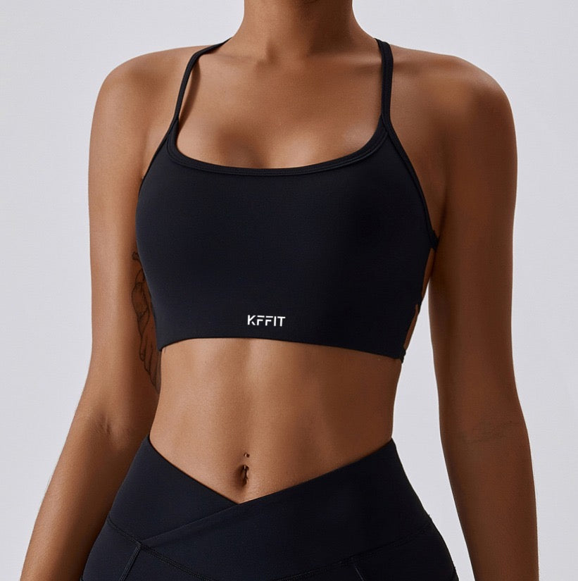 KFFIT sports bra and scrunch shorts set shown on a model, featuring athletic wear in vibrant colors with breathable fabric.